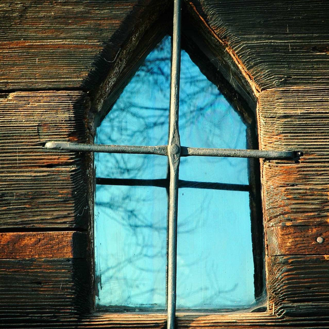 Photo of a window of the Wooden churches of Maramures